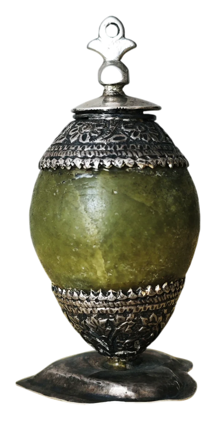 Green serpentine stone vase with a silver filigree lid